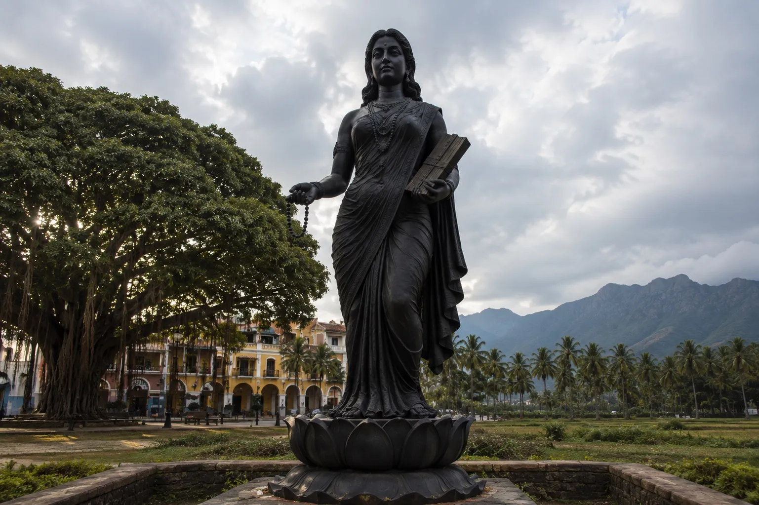 The statue of Annai Thamizh on a lotus at the heart of the estate